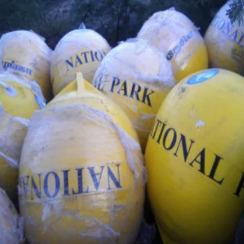 Buoys wrapped and stacked, marked for the National Park boundary