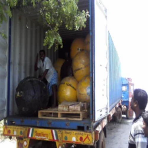 Loaded onto a container truck for the road out to the coast